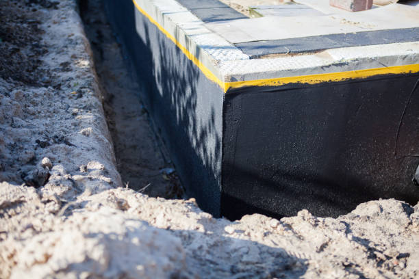 Professional Waterproofing technician working in Woodbine, NJ